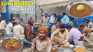 SUPER TASTED LOW BUDGET BREAKFAST IN LAHORE ON ROAD SIDE  ASLAM DHABA HOUSE  CHANAY PAYE HALWA [upl. by Arremat]