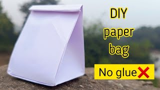 Origami paper bagHow to make paper bag without glueNo glue paper craftDIY gift bagNo glue bax [upl. by Clemente]