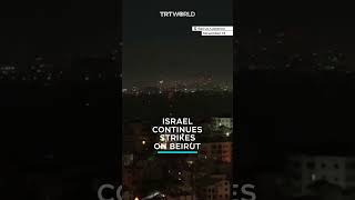 Israeli air strikes hit a building in Lebanons Beirut [upl. by Bartlett]