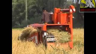 halfcombine harvester with tank harvesting paddy [upl. by Alram]