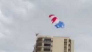 Parasailing Crash Caught on Tape Teens Slam Into Building In Critical Condition [upl. by Kcirted]