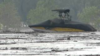 Lake Dunlap Flood 2015  yellow Nautique goes over dam [upl. by Denyse]