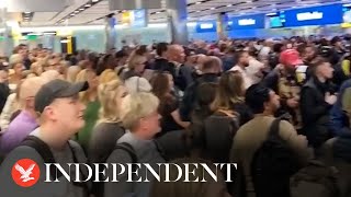 Heathrow travellers cheer after epassport gates reopen following nationwide outage [upl. by Olnee185]