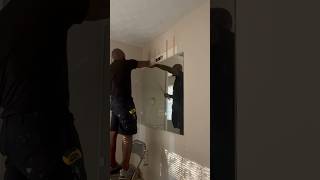 Frameless mirror removal DIY diyproject bathroom [upl. by Kolva271]