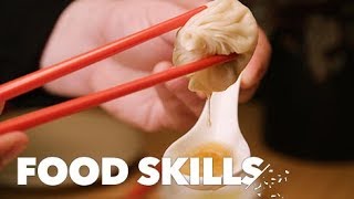 How to Eat Soup Dumplings Like a Pro  Food Skills [upl. by Nyladnarb175]