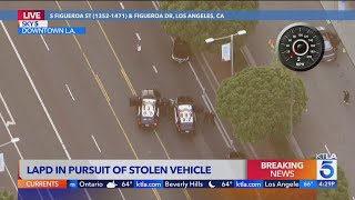 Police pursue stolen vehicle in downtown Los Angeles [upl. by Ycnan]