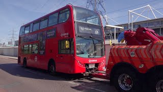 Three brokendown London buses being towed away [upl. by Anima]