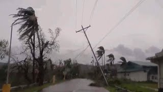 Typhoon Manyi sends hundreds of thousands fleeing in the Philippines [upl. by Dilahk885]