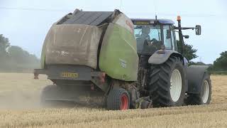 NEW HOLLAND TM155 AND CLAAS VARIANT 385 ROUND BALER [upl. by Hyams61]