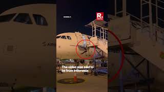 Airline Worker Falls Off Airbus A320 As Ground Staff Remove Ladder At Jakarta Airport In Indonesia [upl. by Slaohcin]