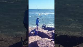 Catching a red fish from the jetty fishing jettyfishing redfish texasfishing bigfish [upl. by Lubbock]