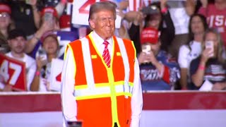 Donald Trump arrives at Wisconsin rally in hivis after Biden garbage insult [upl. by Earezed]