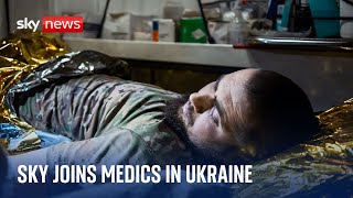 The shrapnel is sticking out of my leg Sky News joins Ukrainian medics on the frontline [upl. by Assyli]