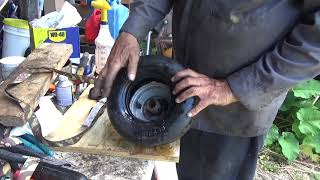 mower tire put on rim  hand tools only  11x4x5 karam method [upl. by Porett]