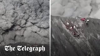 Moment climbers run for their lives as volcano erupts in Indonesia [upl. by Cadmar]