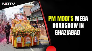 PM Modi In Ghaziabad  PM Modis Mega Roadshow In UPs Ghaziabad [upl. by Nosidam]