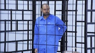 Libya Colonel Gaddafis son Saif alIslam sentenced to death [upl. by Manson]