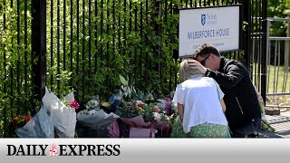 Flowers left outside Wimbledon primary school where car crash killed young girl [upl. by Schober]