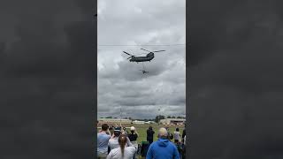 Chinook overflying the Red Arrows while carrying a cannon [upl. by Randene76]