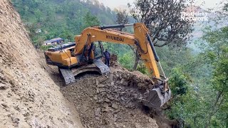 Strong Excavator Constructing a Motor Road on a Perilous Steep Hill [upl. by Ettenig]