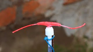 CÓMO HACER UN ASPERSOR GIRATORIO DE AGUA PARA EL JARDÍN CASERO CON BOTELLAS RECICLADAS [upl. by Ylrebmi]