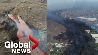 La Palma volcano Drone video shows lava flowing from new vent ash raining from crater [upl. by Eagle]