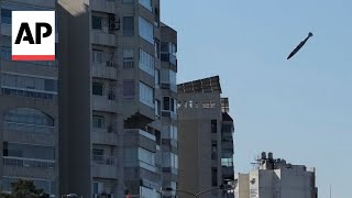 AP photographer captures bomb falling in his childhood neighborhood in Beirut [upl. by Hseyaj]