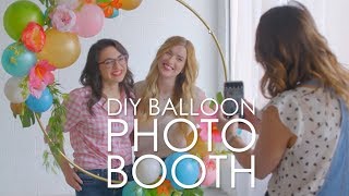 Make a DIY Balloon Photo Booth Prop  HGTV Happy  HGTV [upl. by Nomae]