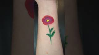 November Poppy Story rememberanceday rememberance facepaint painting flowerpainting art poppy [upl. by Necaj]