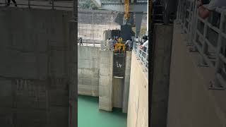 Insertion of filler beam in spillway guide damexploration nature travel waterdam [upl. by Zelten710]