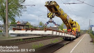 Bordesholm Vorbeifahrt STRABAG Gleisbaukran KRC 910 BR 9419 aka auf Betriebsfahrt [upl. by Shwalb]