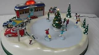 Mr Christmas Rock N Roll Christmas Animated Musical Diner Skating Rink [upl. by Aysahc540]