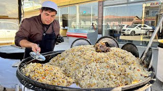 Popular Uzbek pilaf in a big pot l Street food in Uzbekistan [upl. by Kyre]