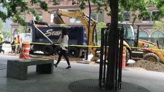 Backhoe truck digging up street in Astor Place NYC [upl. by Maitilde]