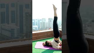 Woman doing headstand yoga pose  Young woman doing yoga exercise shorts soothingrelaxation relax [upl. by Novelia]