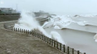 Spectacular amp Scary tidal bore surges up Qiantang River in China [upl. by Ennayk]