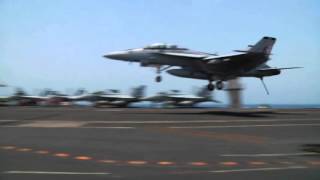 F18 Carrier Landing FA18 Hornet Jet Fighter Lands on US Navy Aircraft Carrier Deck Crew Video View [upl. by Stila788]