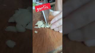 chopping garlic cooking healthy shortvideo trending [upl. by Nylanaj]