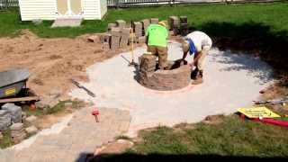 Stacking retaining wall block for a fire pit in Littlestown Pa Ryans Landscaping [upl. by Merridie824]