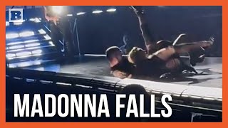 65YearOld Madonna Falls Off Chair Being Pulled by Man Running in Heels [upl. by Adnert328]