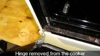 How to change an oven door hinge on a cooker Indesit K341G [upl. by Devinne]