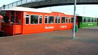 Langeoog Inselbahn vom Hafen Abfahrt in den Ort [upl. by Seften]