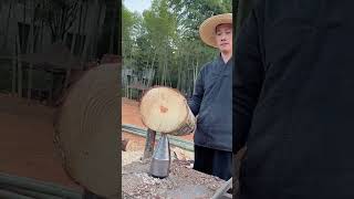 The process of splitting wood with a cracking drill [upl. by Hatch]