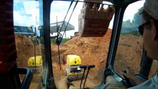 Excavators Backfilling and Compacting Pipe [upl. by Milka344]