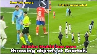 Madrid derby temporarily suspended because Atletico Madrid fans were throwing objects at Courtois [upl. by Clarine]