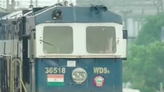 NAVY BLUEWHITENAVY BLUE GE CAB SHUNTER ENGINE MOVES AT YARD WDS6 36518 [upl. by Elleinnad]