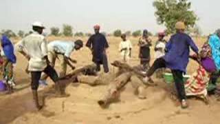 Fulani at their well Niger West Africa  March 2006 [upl. by Beilul]