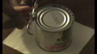 How to Open a can using can opener [upl. by Burrus48]