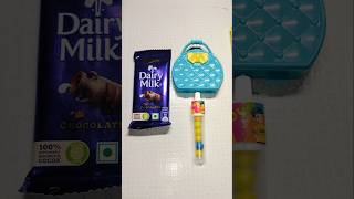 Dairy milk Chocolate or Gems ChocolatPopsicle youtubeshorts viralvideo [upl. by Suoivatnod]