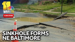 Sinkhole opens up after water main break in northeast Baltimore [upl. by Alanson278]